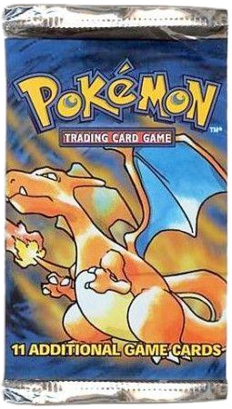 A sealed Pokemon Base Set booster pack featuring Charizard artwork.