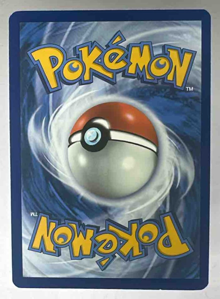 The back of a standard Pokemon trading card featuring the classic blue and white swirl design.