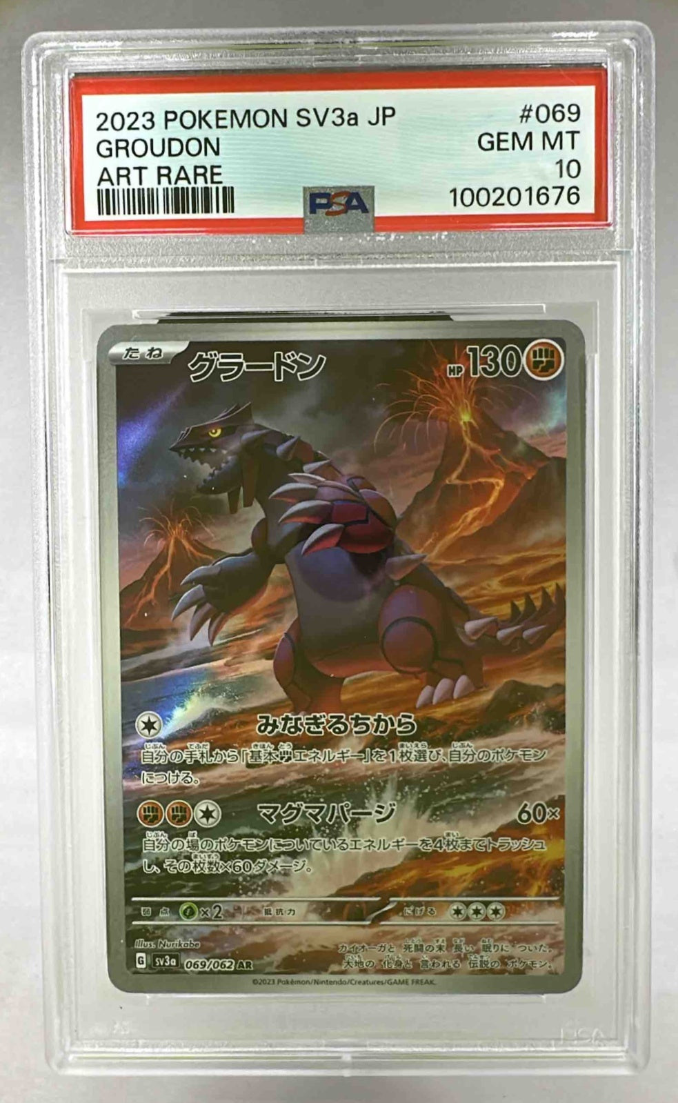 A PSA 10 graded Japanese Groudon Art Rare Pokemon card from the Raging Surf set.