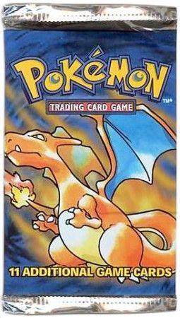 A sealed Pokemon Base Set booster pack featuring Charizard artwork.