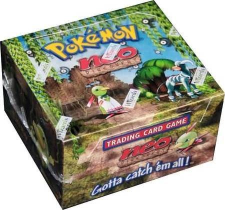 A sealed Pokemon Neo Discovery booster box featuring artwork of Xatu and Houndoom.