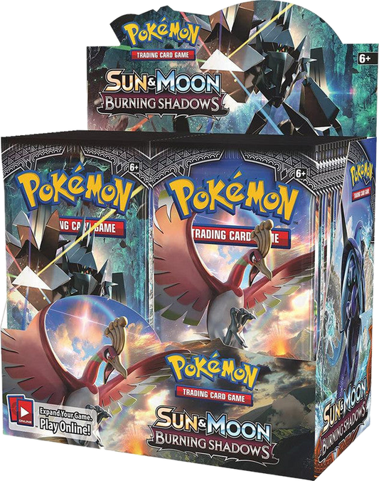 A sealed Pokemon Sun and Moon Burning Shadows booster box featuring Ho-Oh and Necrozma artwork.