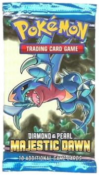 A sealed Pokemon Majestic Dawn booster pack featuring Garchomp on the blue packaging.