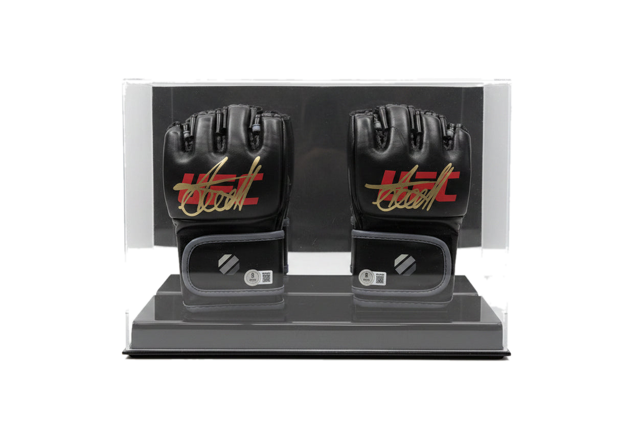 A pair of black Arman Tsarukyan signature MMA gloves displayed in a clear protective case.