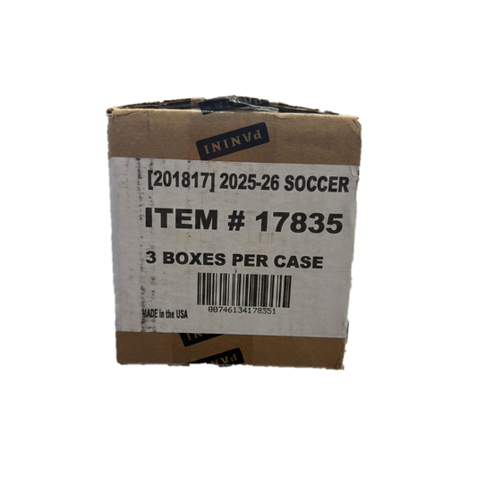 A sealed cardboard case of 2025-26 Panini Noir Road To FIFA World Cup 26 soccer trading cards.