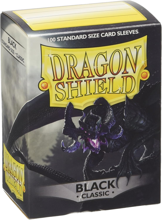 A box of 100 black Dragon Shield classic standard size card sleeves featuring a dragon illustration.