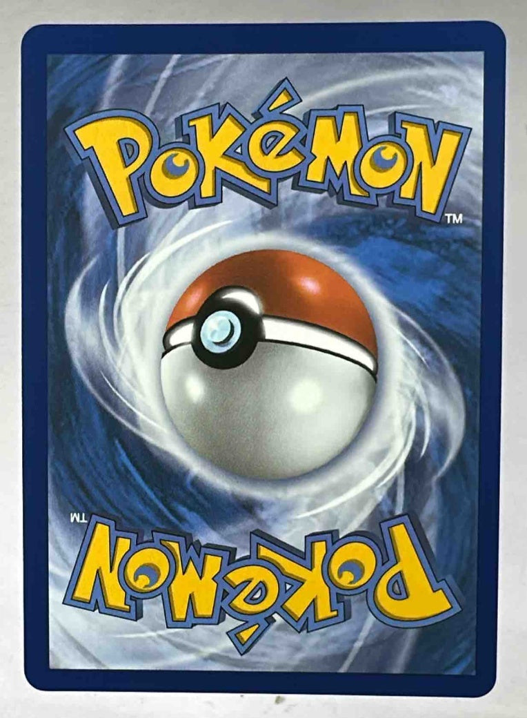 The back of a standard Pokemon trading card featuring the blue swirl and central Poke Ball design.