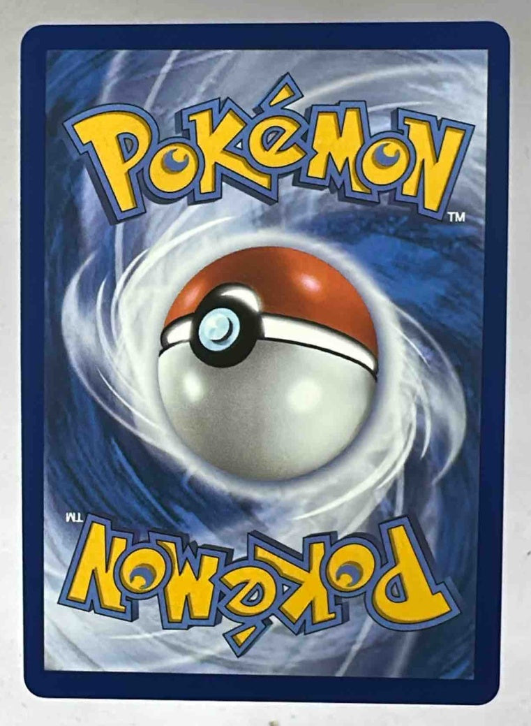 The back of a standard Pokemon trading card featuring the iconic blue swirl and Poke Ball design.