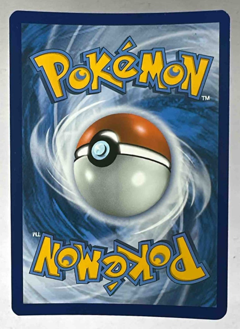 The back of a Pokemon trading card featuring the classic blue swirl and logo design.