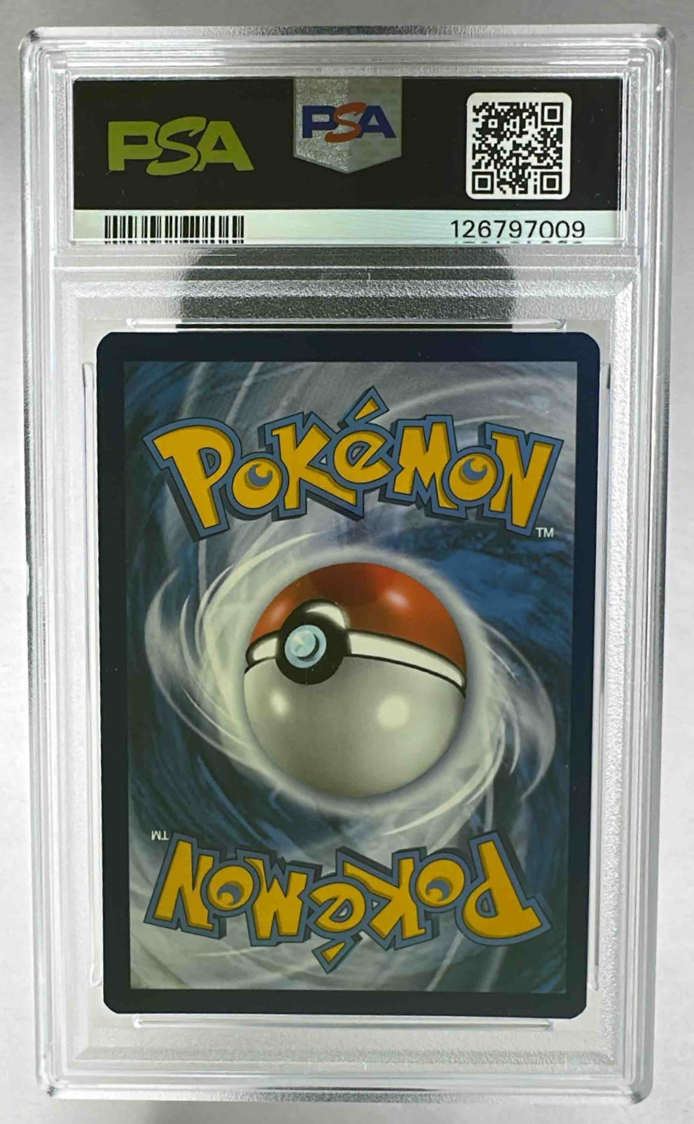 The back of a PSA 9 graded 2022 Pokemon Charizard VST promo card in a protective plastic slab.