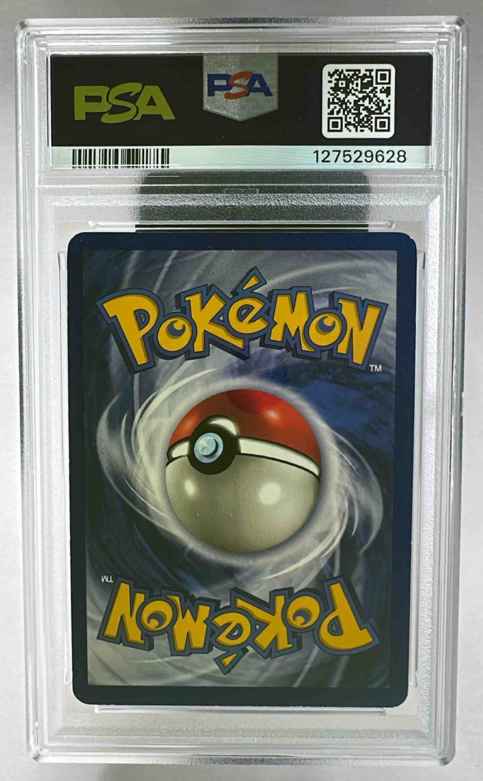 The back of a 1999 Pokemon Shadowless Charizard card encapsulated in a PSA graded plastic slab.