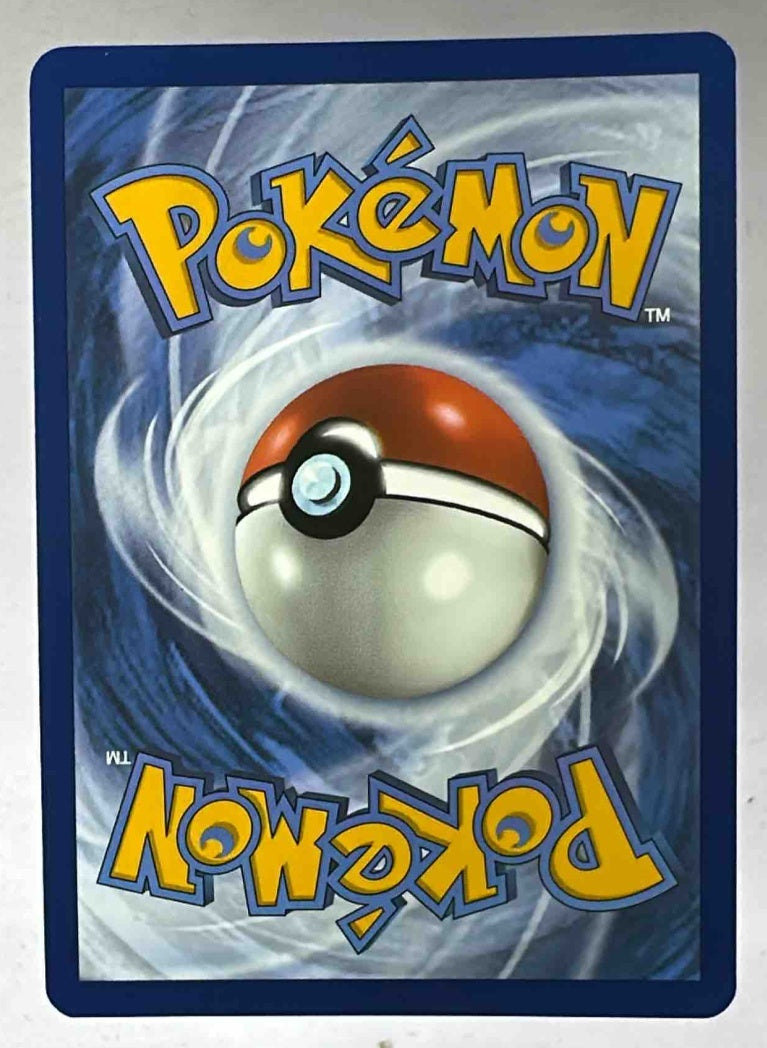 The back of a standard Pokemon trading card featuring the classic blue swirl and logo design.