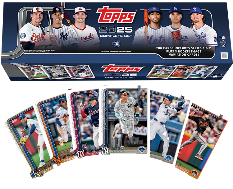 A 2025 Topps baseball complete set box featuring player imagery and sample trading cards.