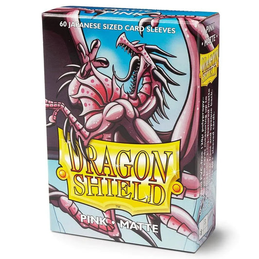 A box of 60 Dragon Shield Japanese size matte pink card sleeves featuring a dragon illustration.