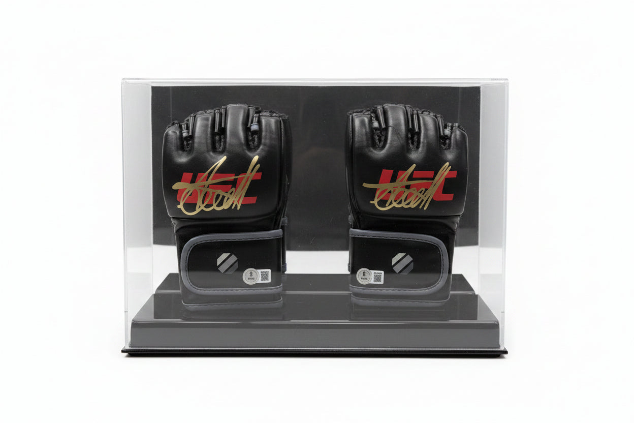 A pair of black Arman Tsarukyan signature MMA gloves displayed in a clear protective case.