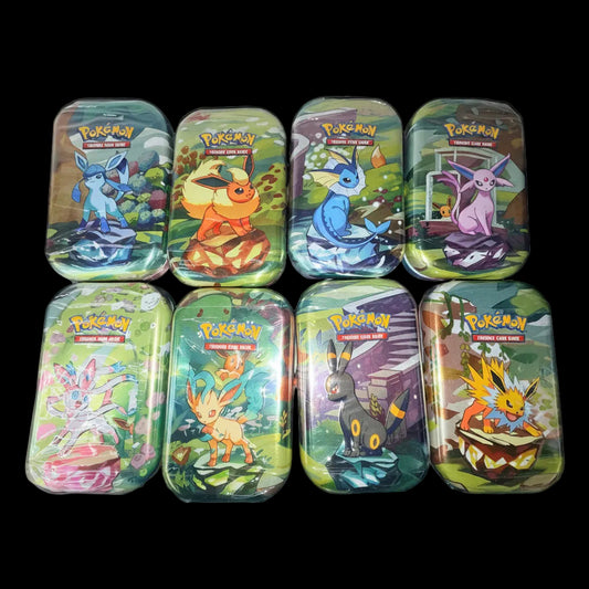 Eight Prismatic Evolutions mini tins featuring different Eevee evolutions arranged in two rows.