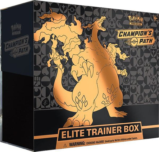 A Champion's Path Elite Trainer Box featuring a gold Charizard illustration on the front.