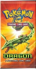 A sealed Pokemon EX Dragon booster pack featuring Rayquaza on the orange packaging.