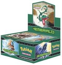 A sealed Pokemon Emerald booster box featuring Rayquaza artwork on the display header.