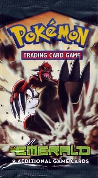 A sealed Pokemon EX Emerald booster pack featuring Groudon on the front.