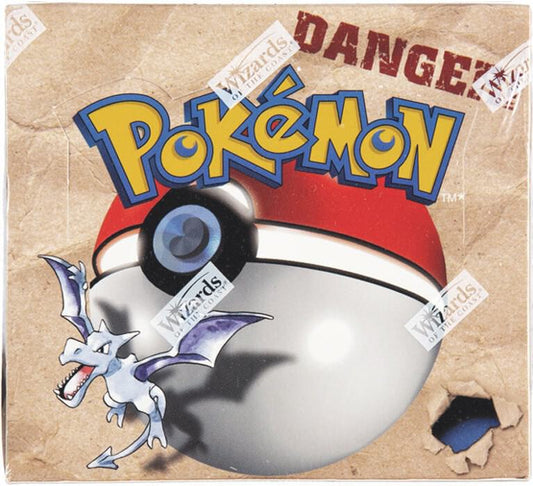 A sealed Pokemon Fossil booster box featuring Aerodactyl artwork and Wizards of the Coast branding.
