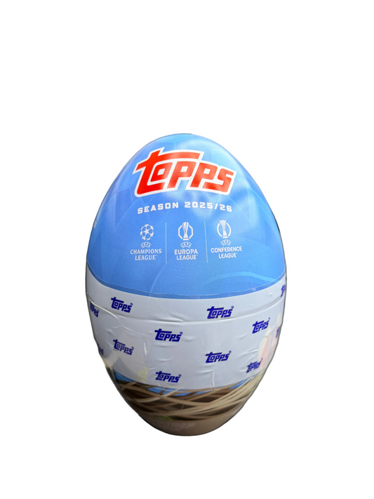 An egg-shaped Topps UEFA club competitions soccer trading card tin for the 2025-26 season.