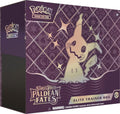 A Pokemon Paldean Fates Elite Trainer Box featuring Shiny Mimikyu on the purple packaging.