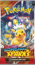A Pokemon Surging Sparks booster pack featuring a crystal-themed Pikachu on the front.