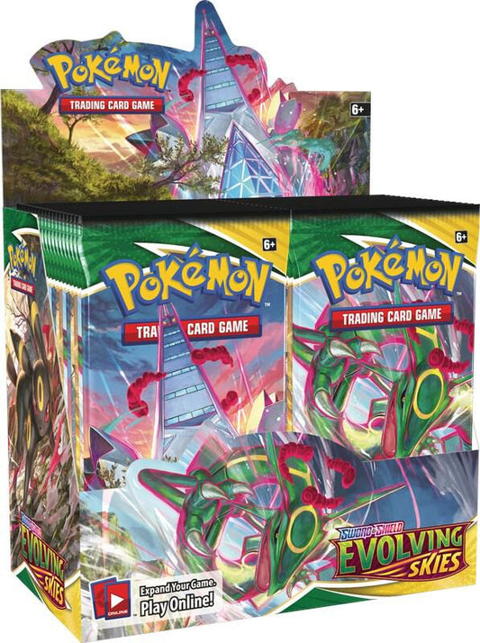 A factory-sealed Pokemon Evolving Skies booster box featuring Rayquaza and Umbreon artwork.