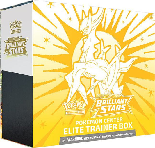 A Pokemon Brilliant Stars Elite Trainer Box featuring Arceus on a yellow background.