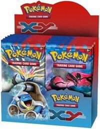 A sealed Pokemon XY booster box featuring Xerneas, Yveltal, and Blastoise on the packaging.