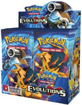 A factory-sealed Pokemon Evolutions XY12 booster box featuring Blastoise and Charizard artwork.