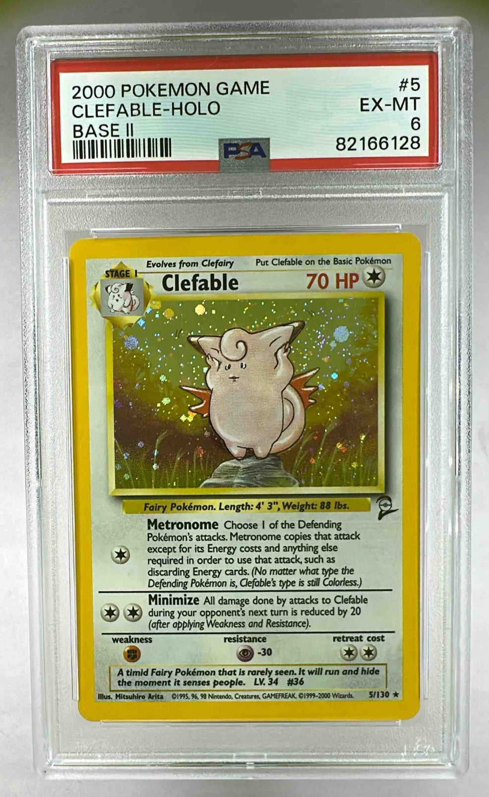 A PSA 6 graded 2000 Pokemon Base Set 2 Clefable holographic trading card in a plastic slab.