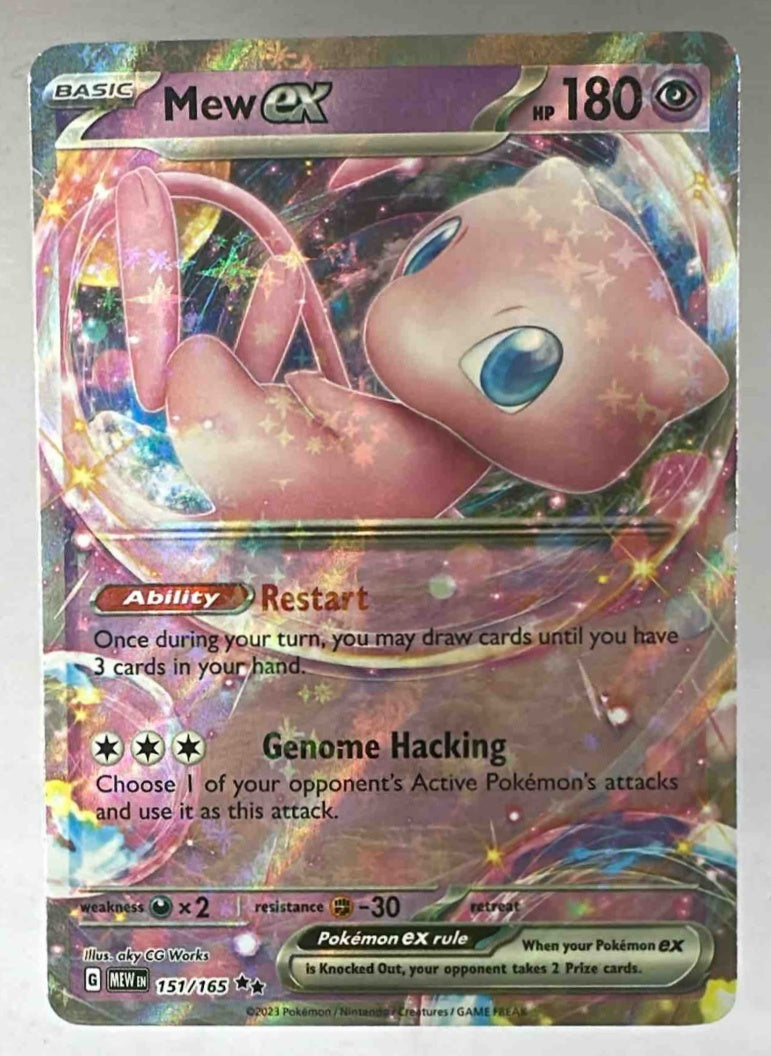 A Mew ex trading card from the 2023 Pokemon Scarlet and Violet 151 set with a reverse holo finish.