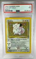 A PSA 7 graded 2000 Pokemon Base Set 2 Clefairy holographic trading card in a plastic slab.