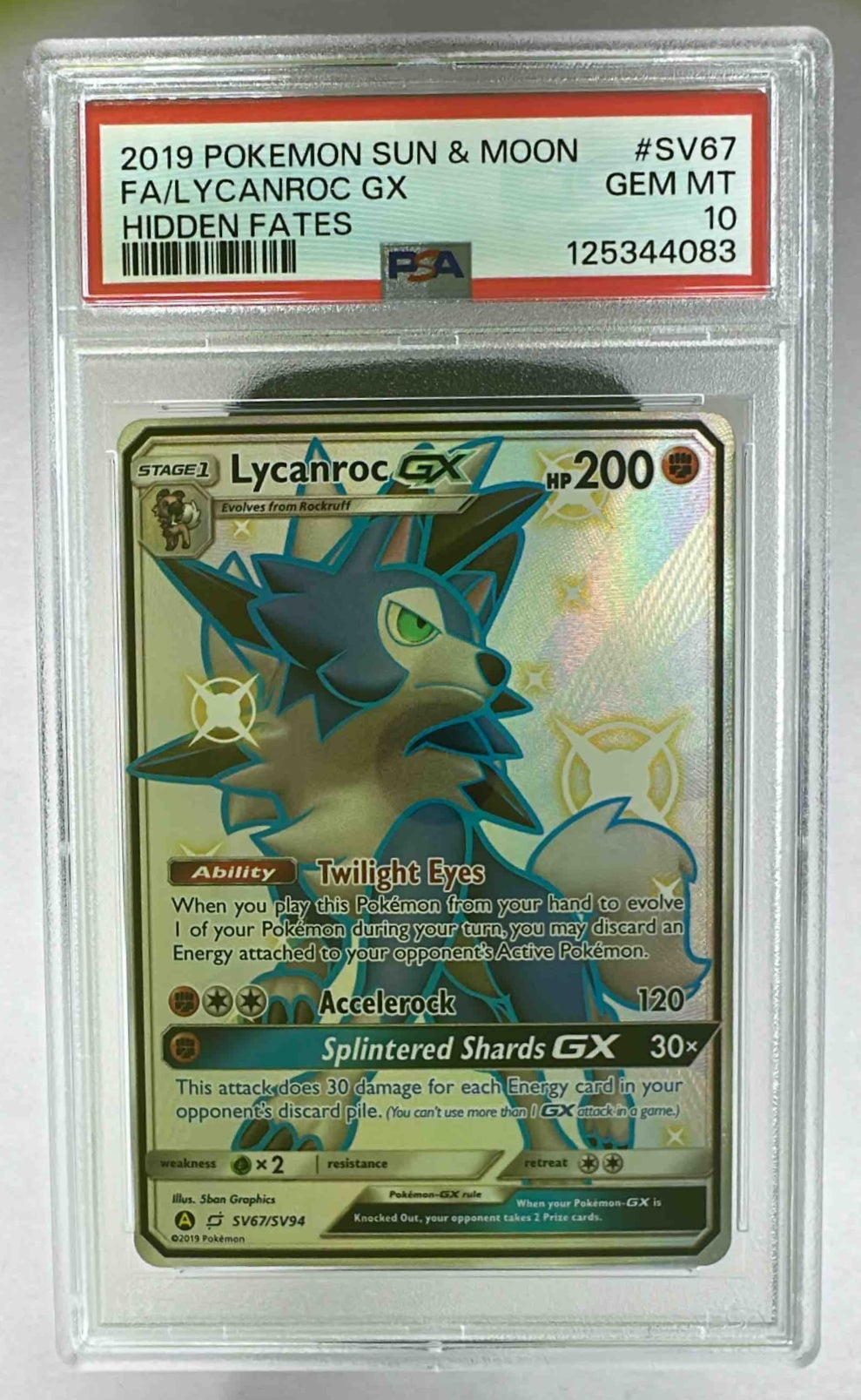 A PSA 10 graded Lycanroc GX shiny Pokemon card from the 2019 Hidden Fates set in a plastic case.