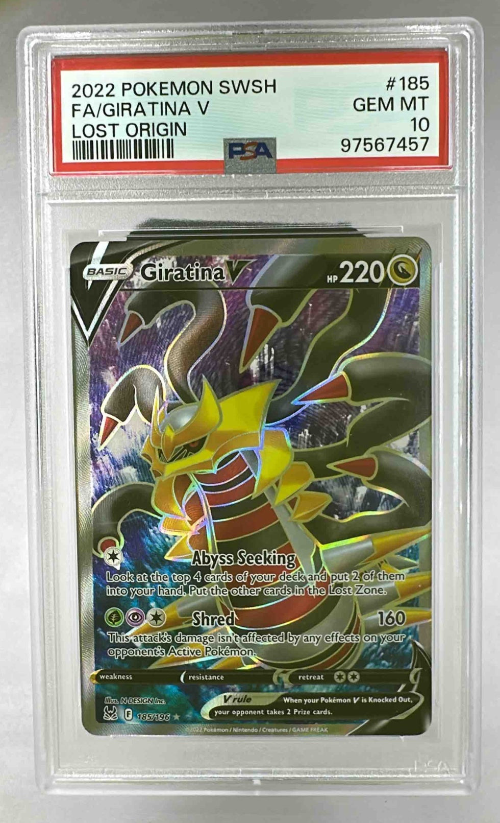 A PSA 10 graded Giratina V Pokemon card from the Lost Origin set in a protective plastic slab.