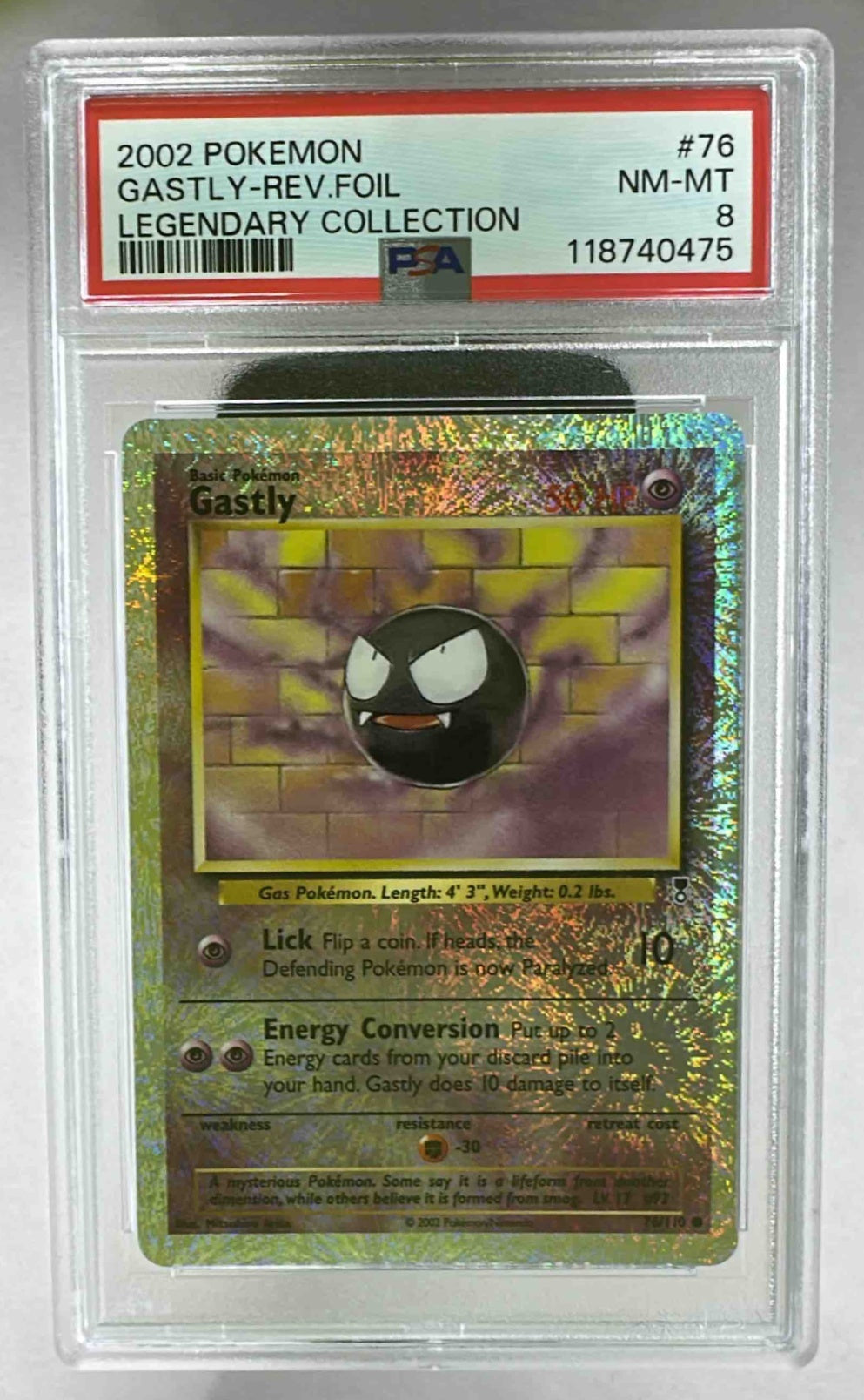 A PSA 8 graded 2002 Pokemon Legendary Collection Gastly reverse holo card in a plastic slab.