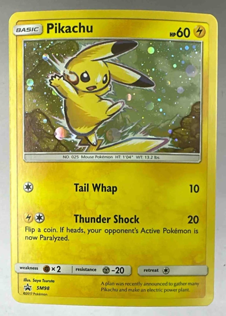 A holographic Pikachu Pokemon card from the Sun and Moon Black Star Promos set numbered SM98.