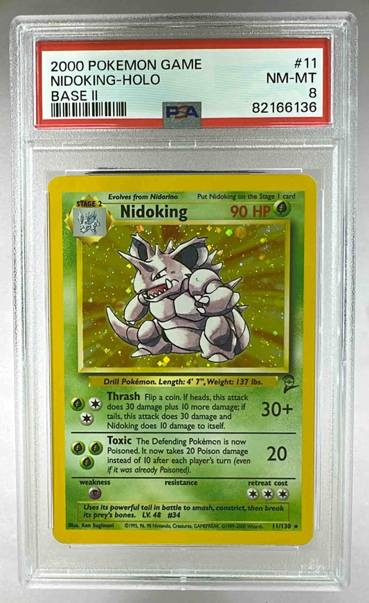 A PSA 8 graded 2000 Pokemon Base Set 2 Nidoking holographic trading card in a protective slab.