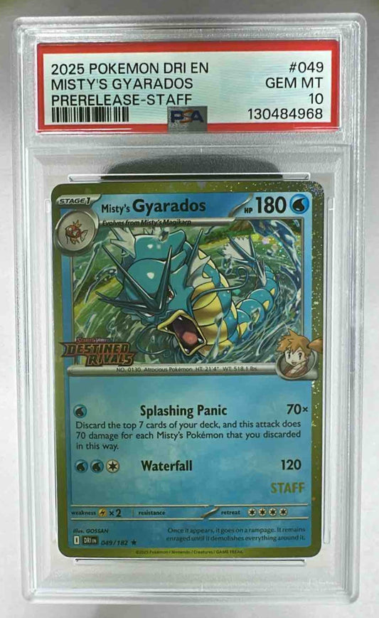 A PSA 10 graded Misty's Gyarados holographic Pokemon card in a protective plastic slab.