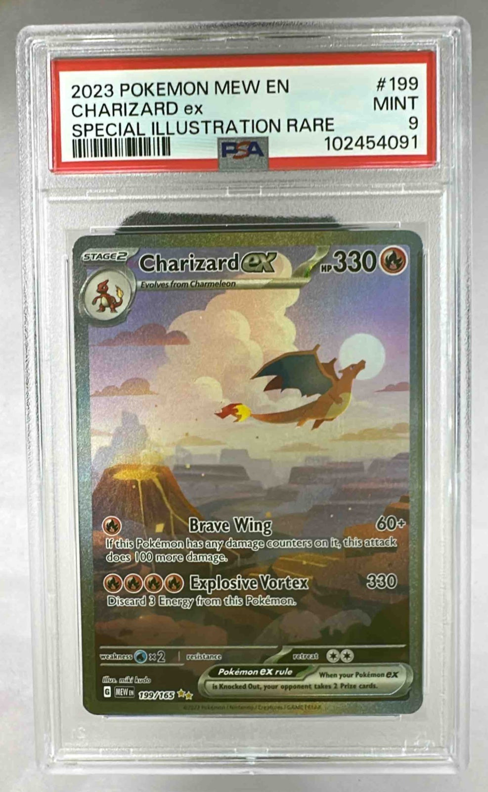 A PSA 9 graded Charizard ex Pokemon card from the 2023 SV 151 set in a protective slab.
