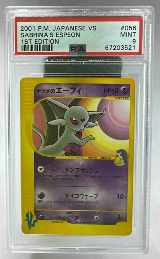 A PSA 9 graded 2001 Japanese Pokemon VS Sabrina's Espeon card in a protective plastic slab.