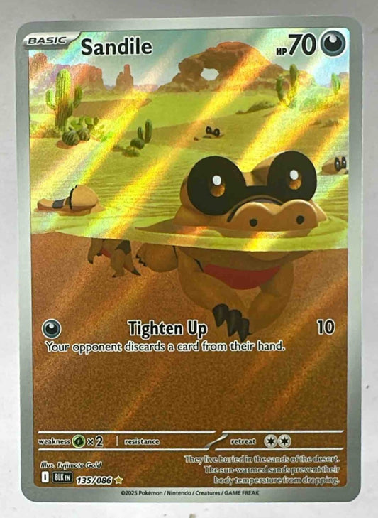 A Sandile Pokemon card featuring full-art illustration of the creature in a desert landscape.