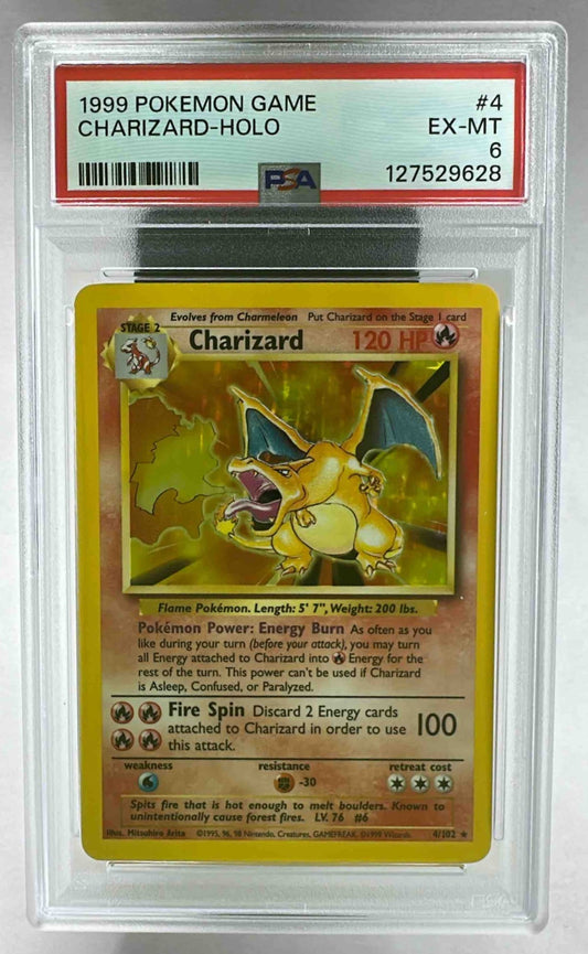 A PSA 6 graded 1999 Shadowless Charizard holographic Pokemon card in a protective plastic slab.