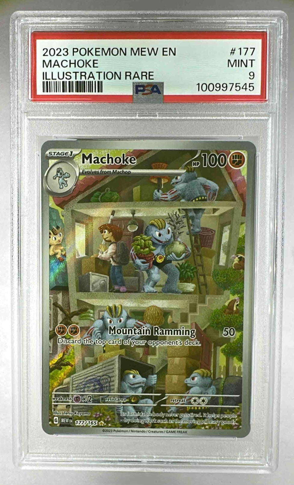 A PSA 9 graded Machoke illustration rare card from the 2023 Pokemon 151 set in a plastic slab.