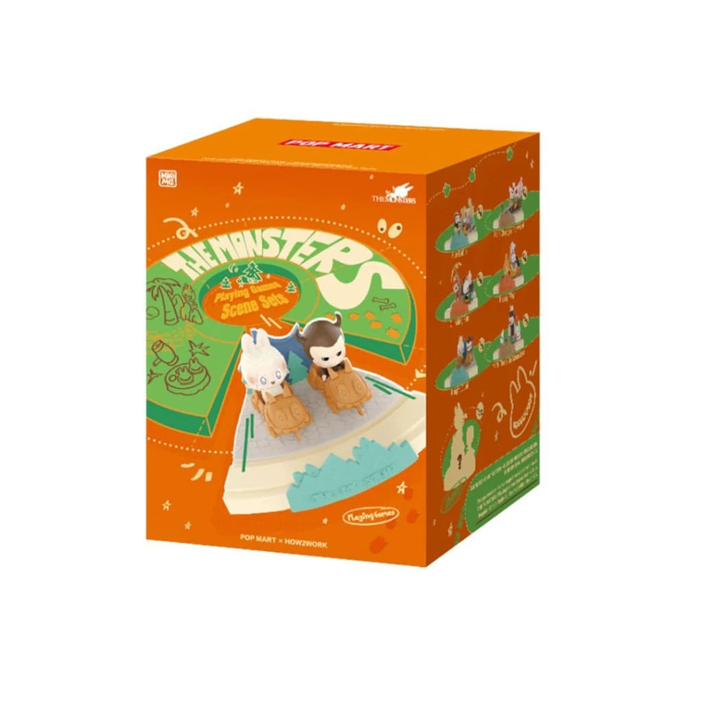 A box for The Monsters Playing Games series featuring two character figures on a display base.